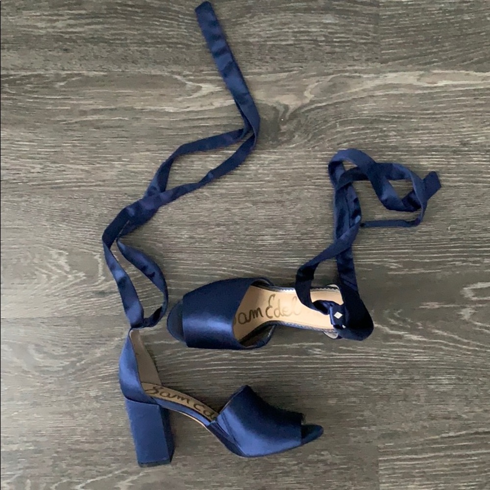 Navy blue lace up block heels.